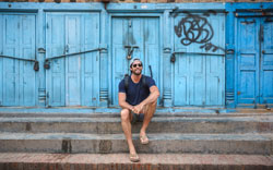 Travis Bluemling traveling in Nepal with NOMATIC gear
