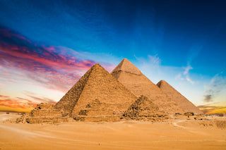 Pyramids of Giza in Egypt at sunset