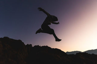 Mountain trail representing progress toward ambitious goals