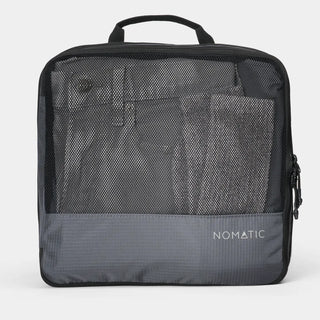 NOMATIC large Compression Packing Cube in gray, mesh top showing packed clothing