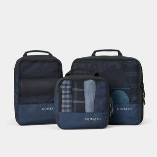NOMATIC Compression Packing Cubes in navy, set of three shown together