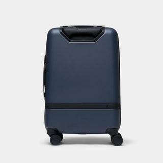 NOMATIC Carry-On Classic in navy, back view showing the top handle